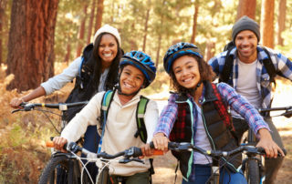 healthy family riding bicycles