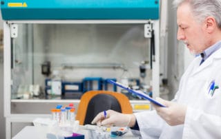 medical scientist organizing investigational drugs